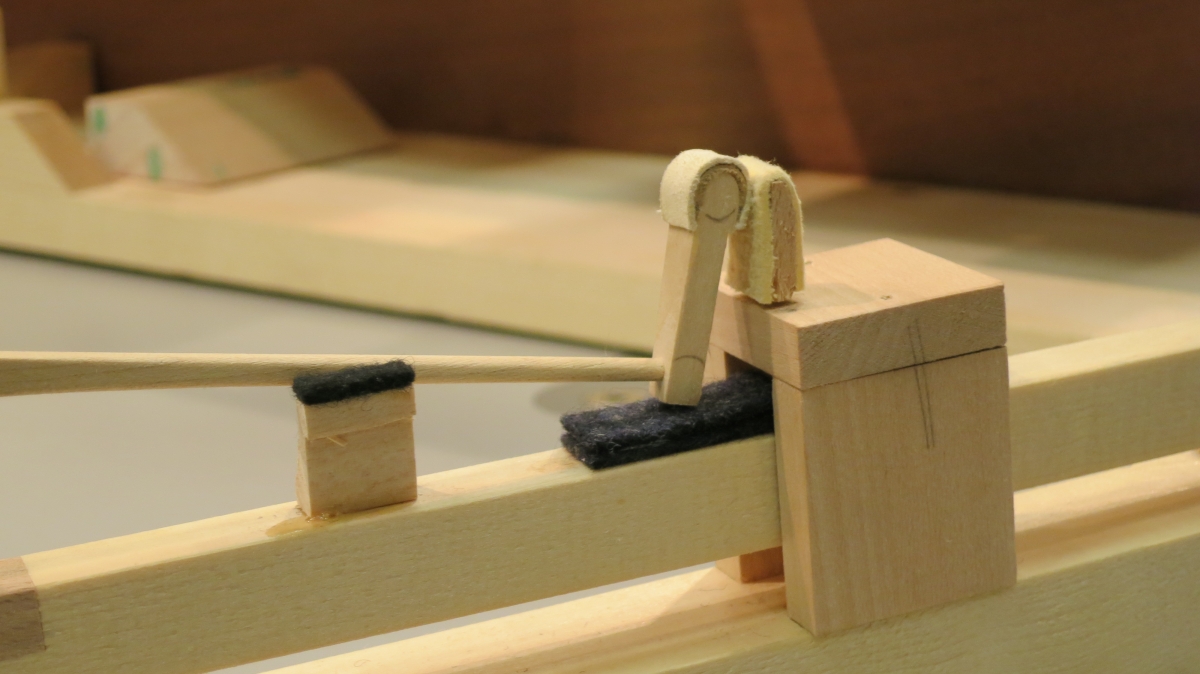 Hammer in rest with back-check  