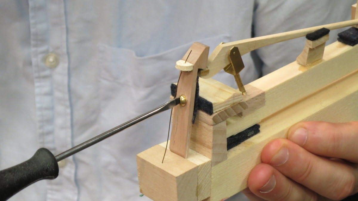 Adjusting the height of the escapement  